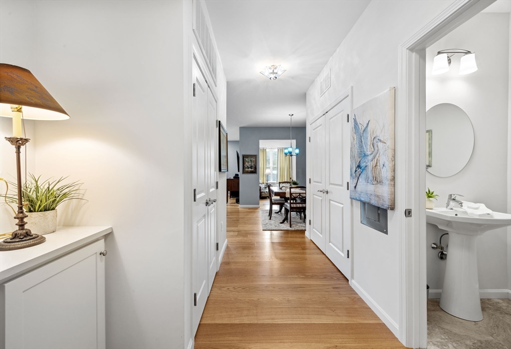 1 Mariner's Way, Unit 204 Plymouth, MA 02360 - Photo 2 of 36 a view of entryway and hall with wooden floor