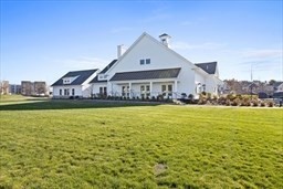 1 Mariner's Way, Unit 204 Plymouth, MA 02360 - Photo 28 of 36 a front view of a house with garden