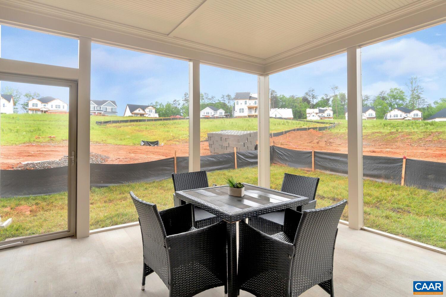 2132 Northside Drive Charlottesville, VA 22911 - Photo 19 of 21 a view of a dining room with a table and chairs