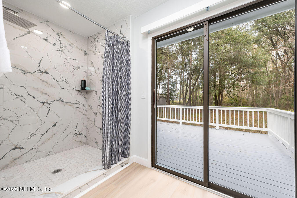 3819 Julington Creek Road Jacksonville, FL 32223 - Photo 14 of 36 a view of a balcony with a small garden