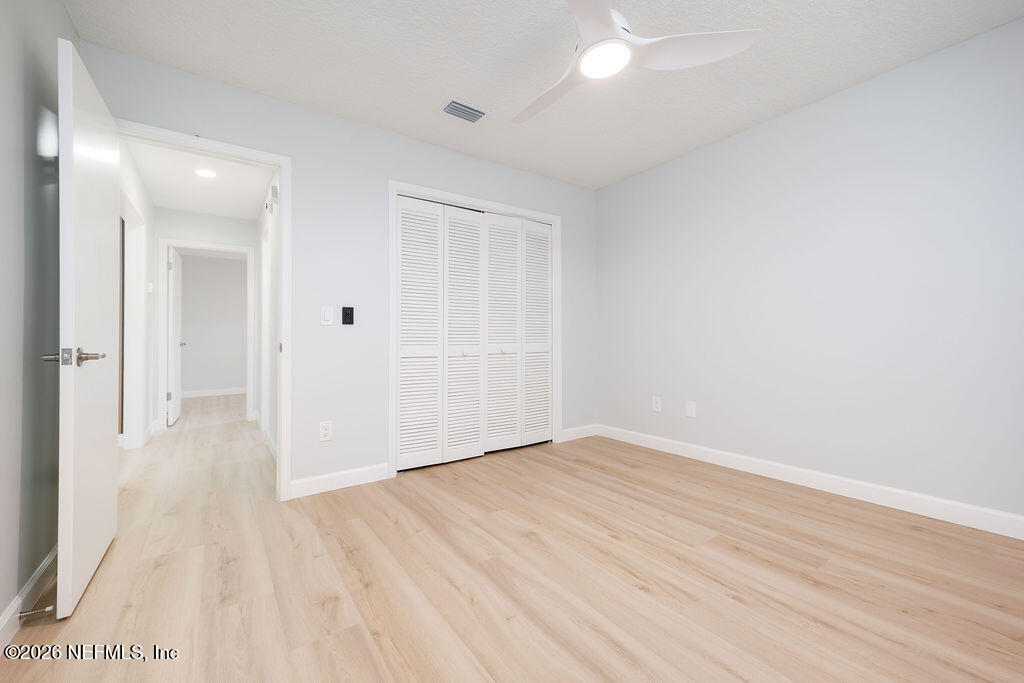 3819 Julington Creek Road Jacksonville, FL 32223 - Photo 18 of 36 wooden floor in an empty room