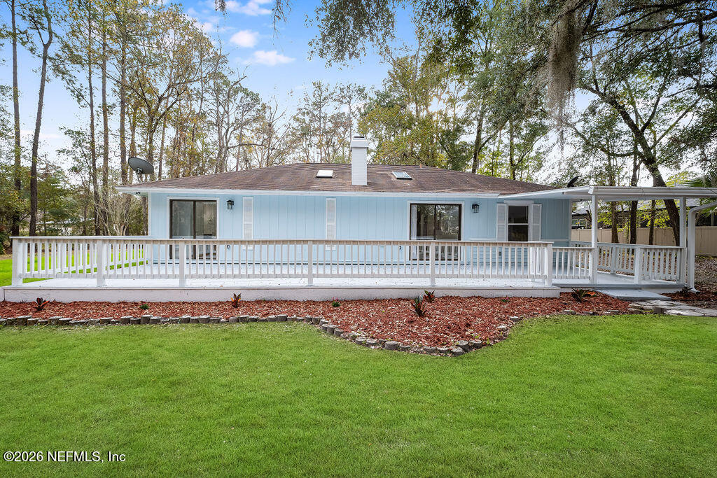 3819 Julington Creek Road Jacksonville, FL 32223 - Photo 24 of 36 a front view of a house with a garden