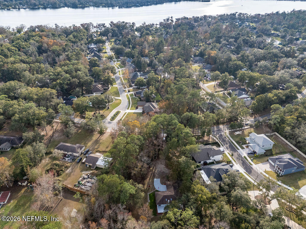 3819 Julington Creek Road Jacksonville, FL 32223 - Photo 30 of 36 an aerial view of residential houses with outdoor space and trees