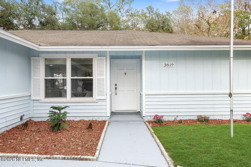 3819 Julington Creek Road Jacksonville, FL 32223 - Photo 3 of 36 a front view of a house with garden
