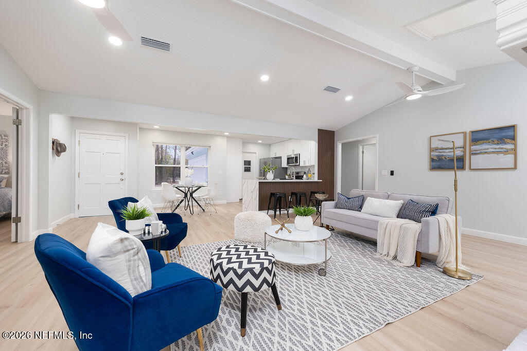 3819 Julington Creek Road Jacksonville, FL 32223 - Photo 5 of 36 a living room with furniture or couch and a table