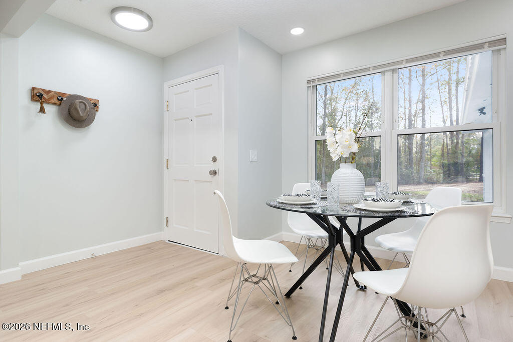 3819 Julington Creek Road Jacksonville, FL 32223 - Photo 9 of 36 a view of a livingroom with furniture and wooden floor