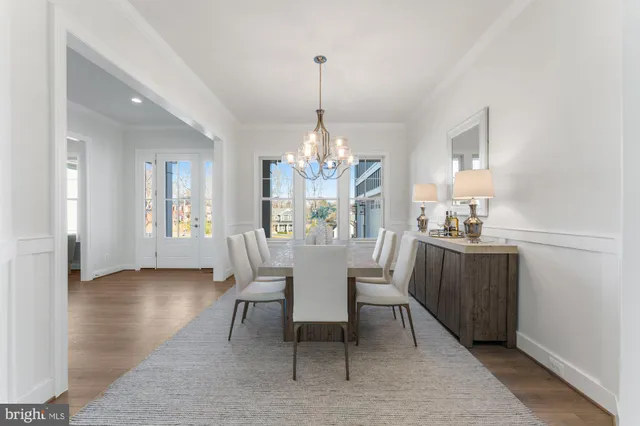 a kitchen with cabinets appliances and a window