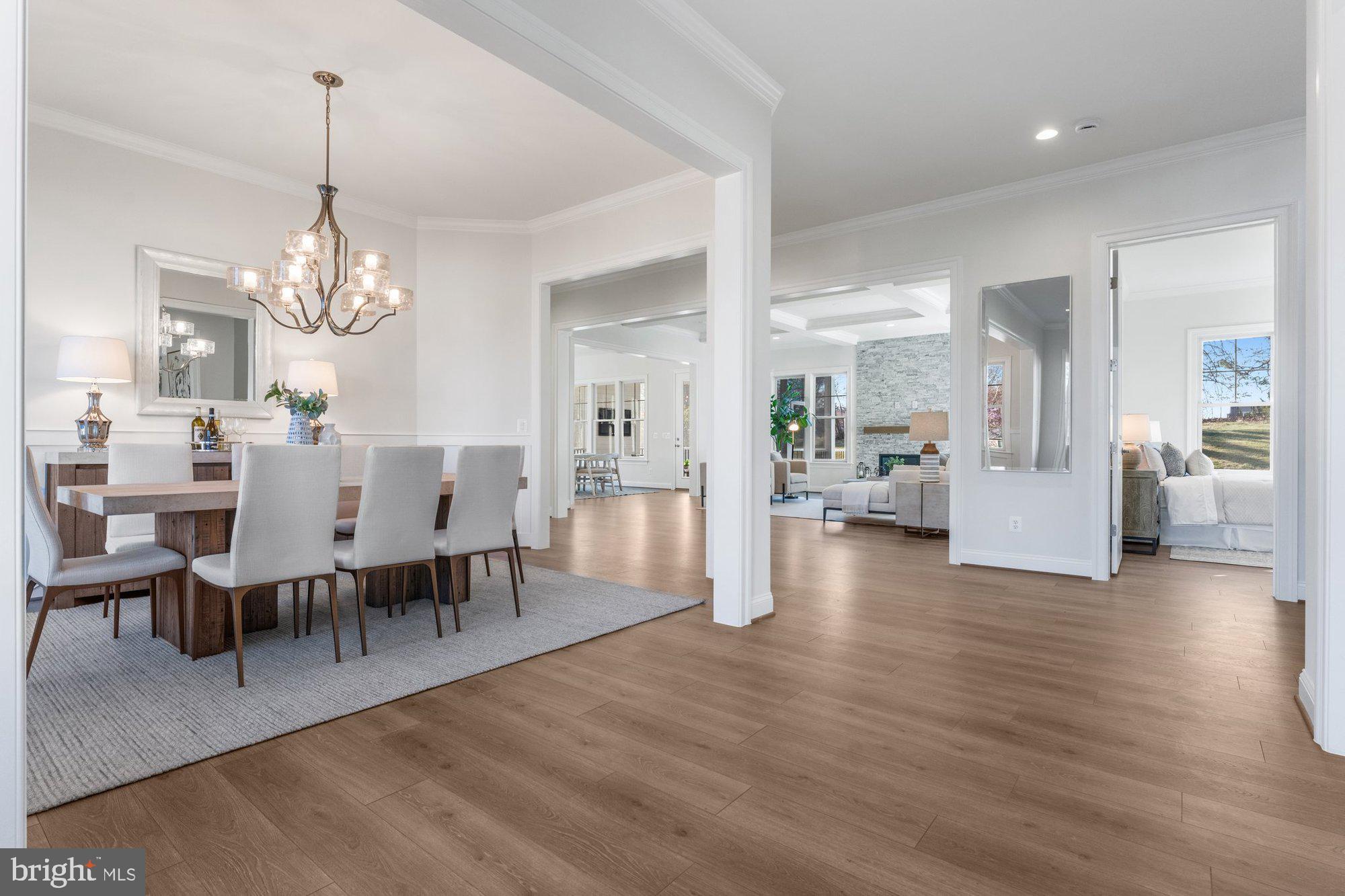 1767 Proffit Road Vienna, VA 22182 - Photo 17 of 117 a view of a dining room with furniture and wooden floor