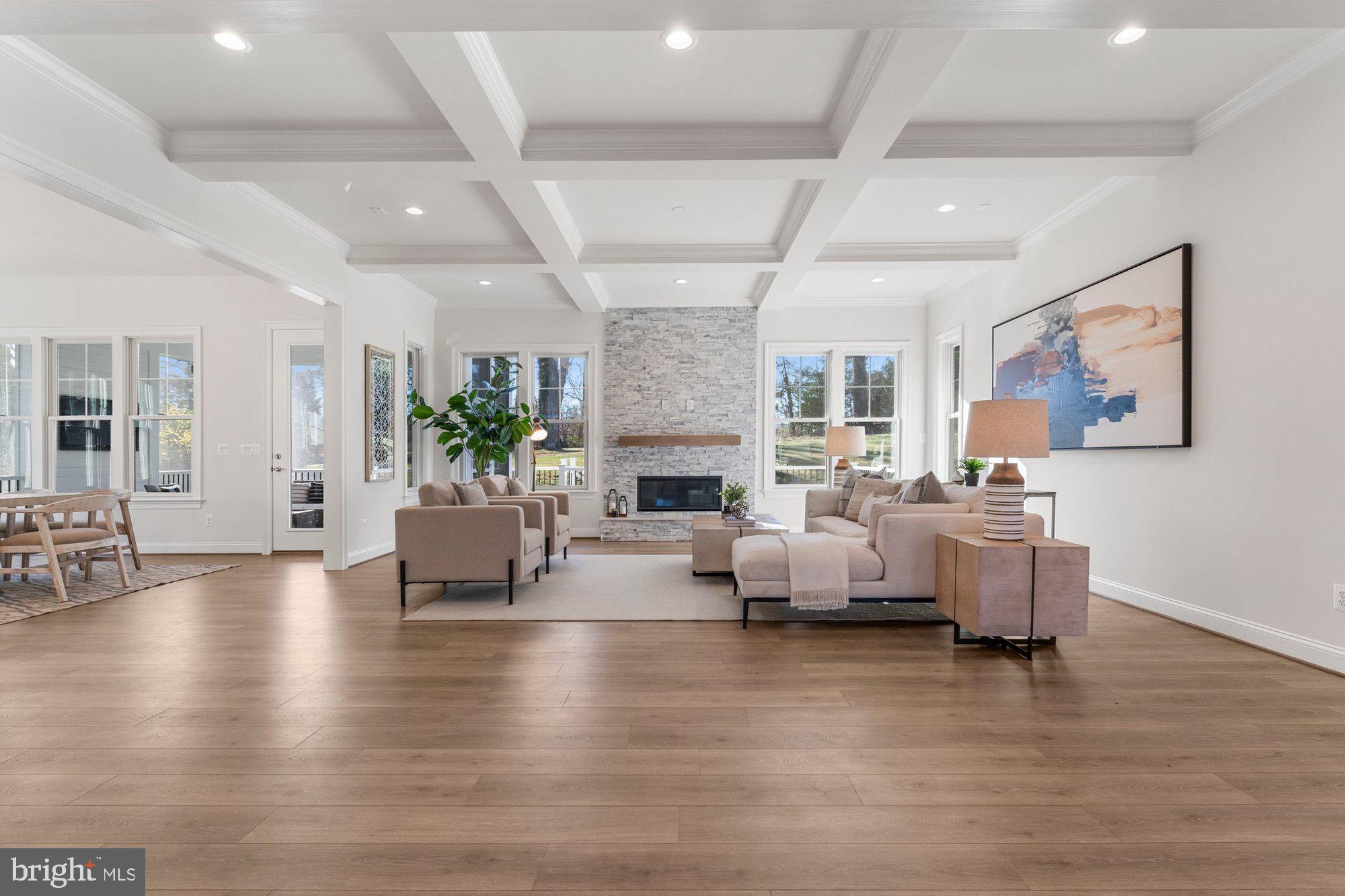 1767 Proffit Road Vienna, VA 22182 - Photo 2 of 117 a living room with fireplace furniture and a wooden floor