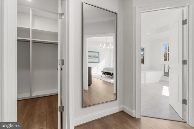 a front view of a house with a yard balcony