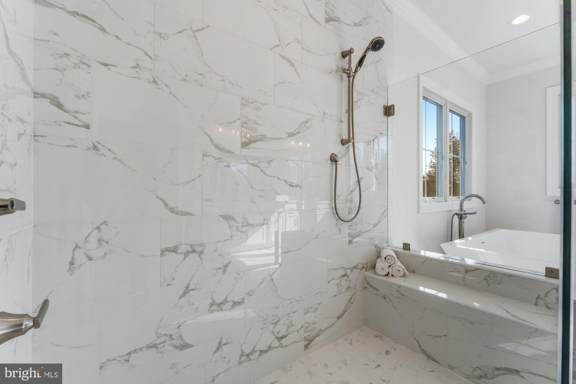 1767 Proffit Road Vienna, VA 22182 - Photo 64 of 117 a bathroom with shower bathtub and sink