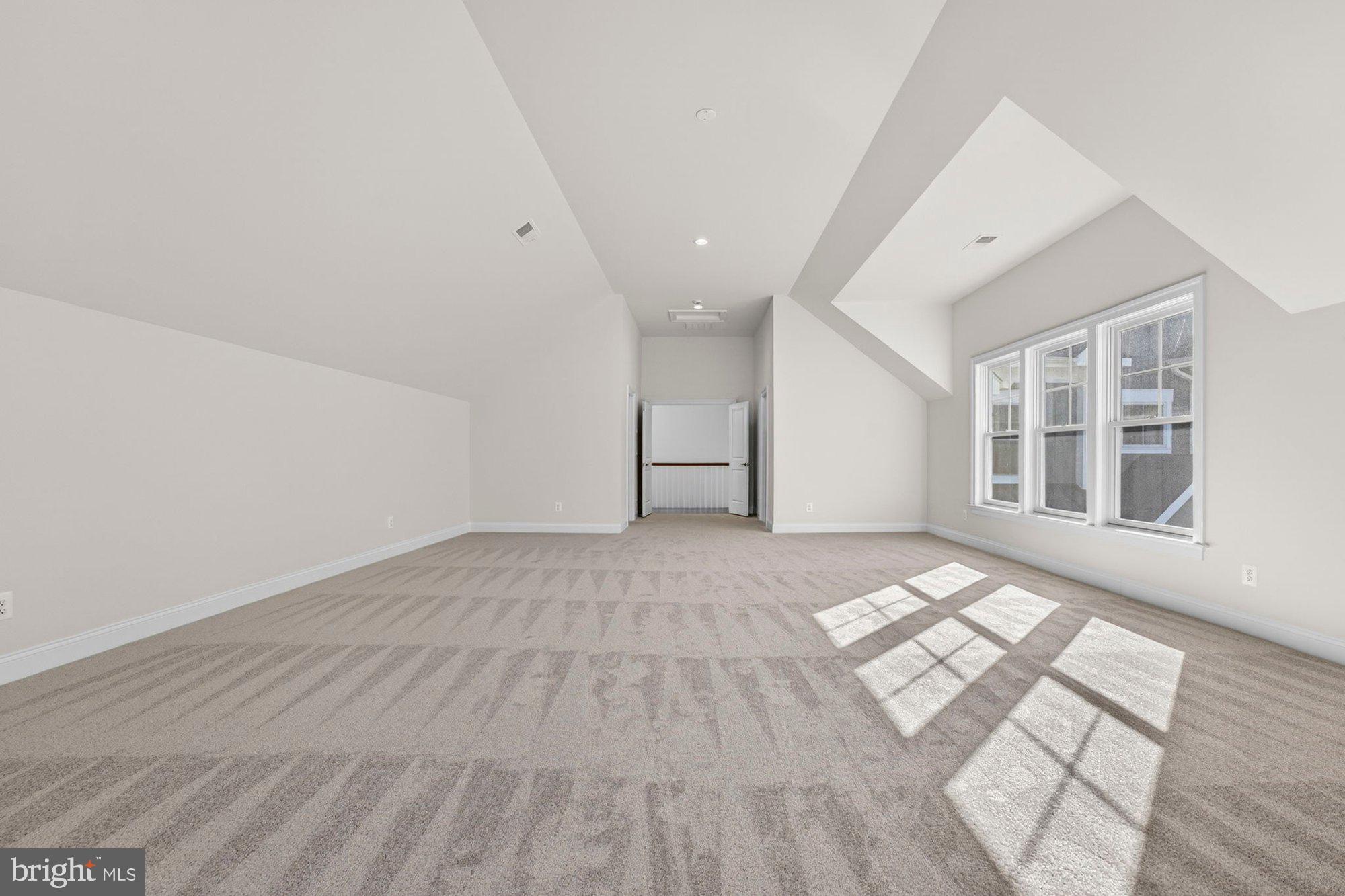 1767 Proffit Road Vienna, VA 22182 - Photo 81 of 117 an empty room with wooden floor and windows