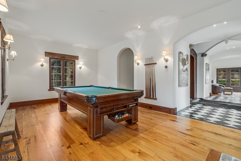 55 State Park Road Chester, NJ 07930 - Photo 8 of 48 a room with pool table and wooden floor