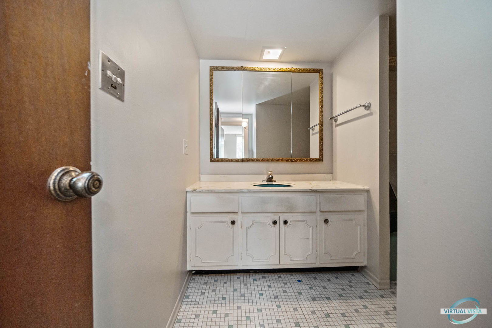 100 West Butterfield Road, Unit 210 Elmhurst, IL 60126 - Photo 11 of 27 a bathroom with a sink a toilet and mirror