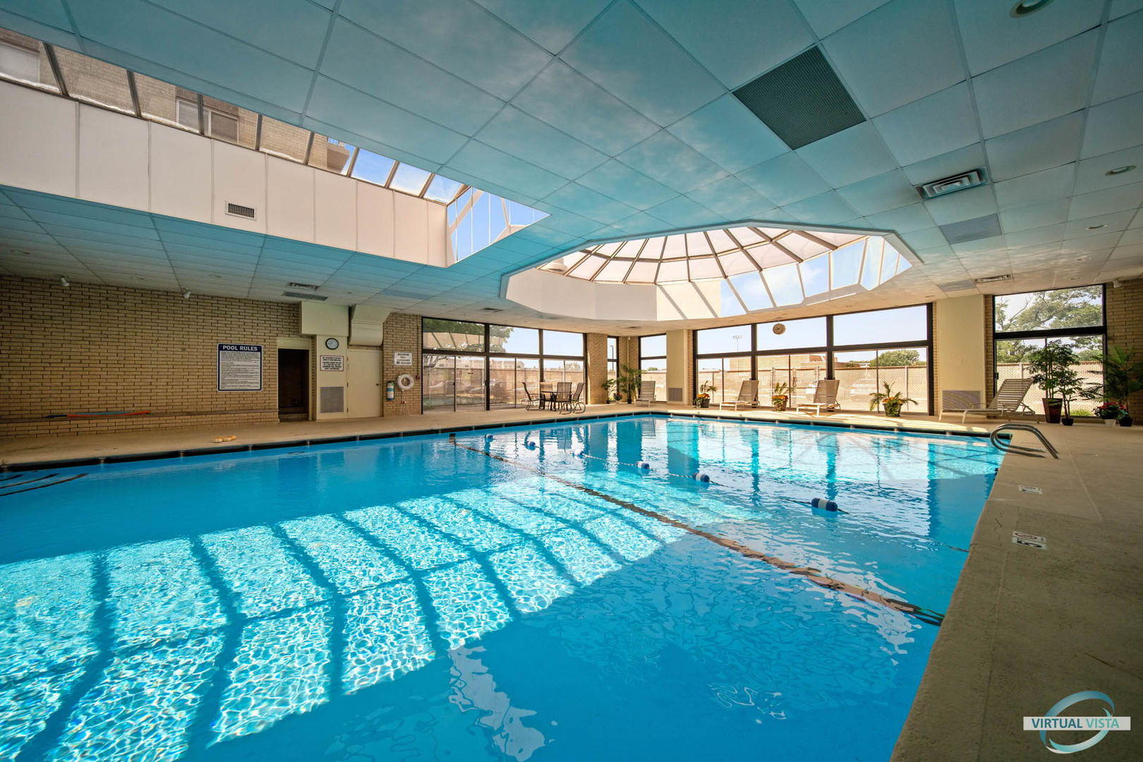 100 West Butterfield Road, Unit 210 Elmhurst, IL 60126 - Photo 14 of 27 a view of swimming pool with an outdoor seating