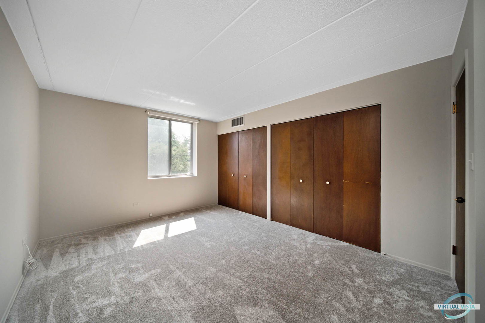 100 West Butterfield Road, Unit 210 Elmhurst, IL 60126 - Photo 19 of 27 a view of an empty room with windows