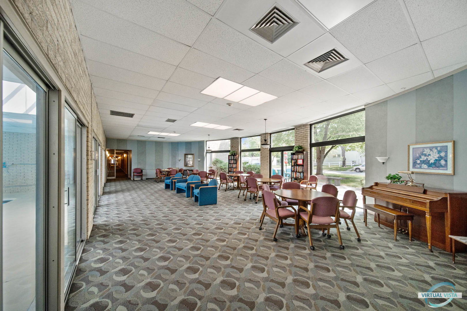 100 West Butterfield Road, Unit 210 Elmhurst, IL 60126 - Photo 23 of 27 a view of a dining room with furniture window and outside view