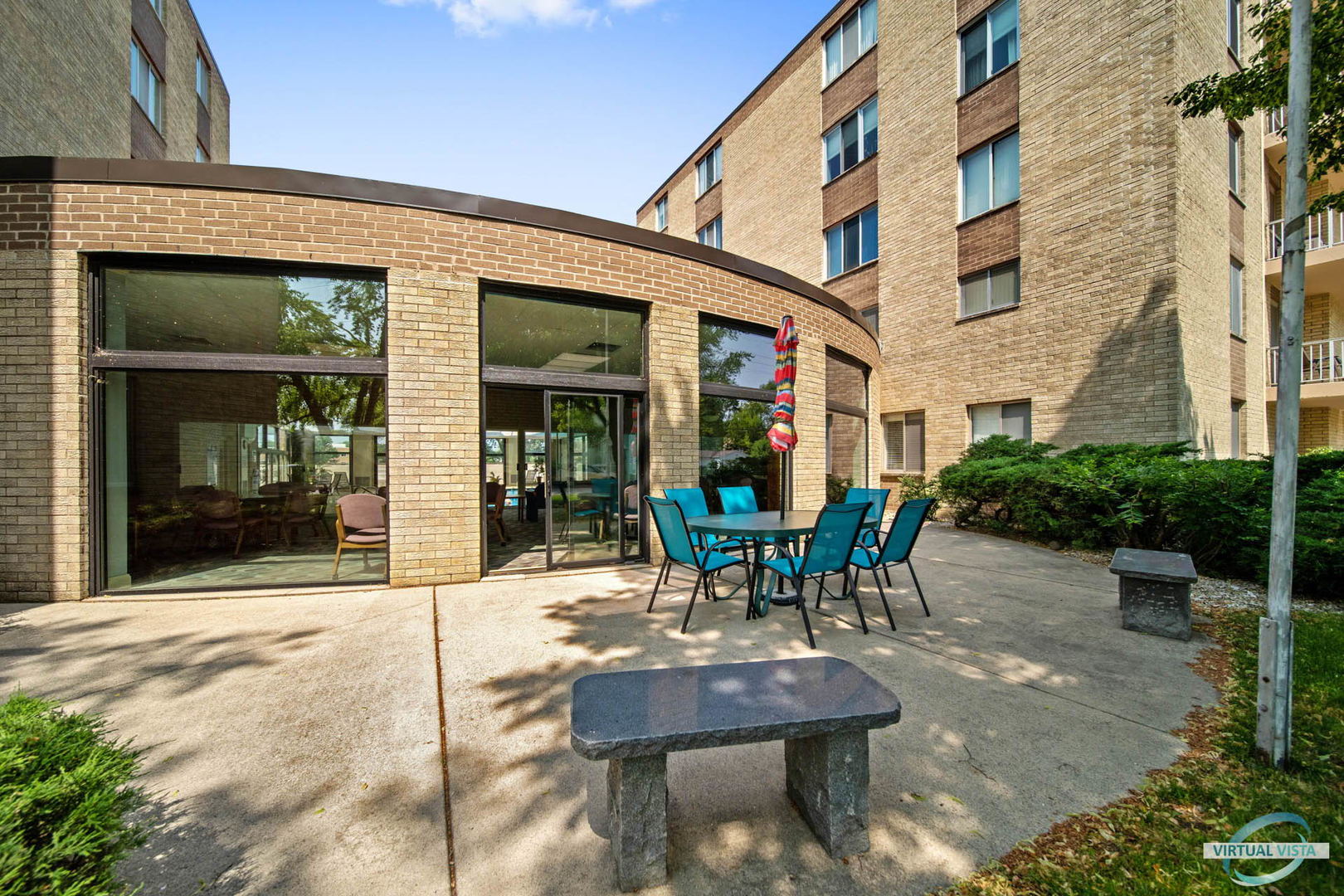 100 West Butterfield Road, Unit 210 Elmhurst, IL 60126 - Photo 24 of 27 a view of a building with sitting area