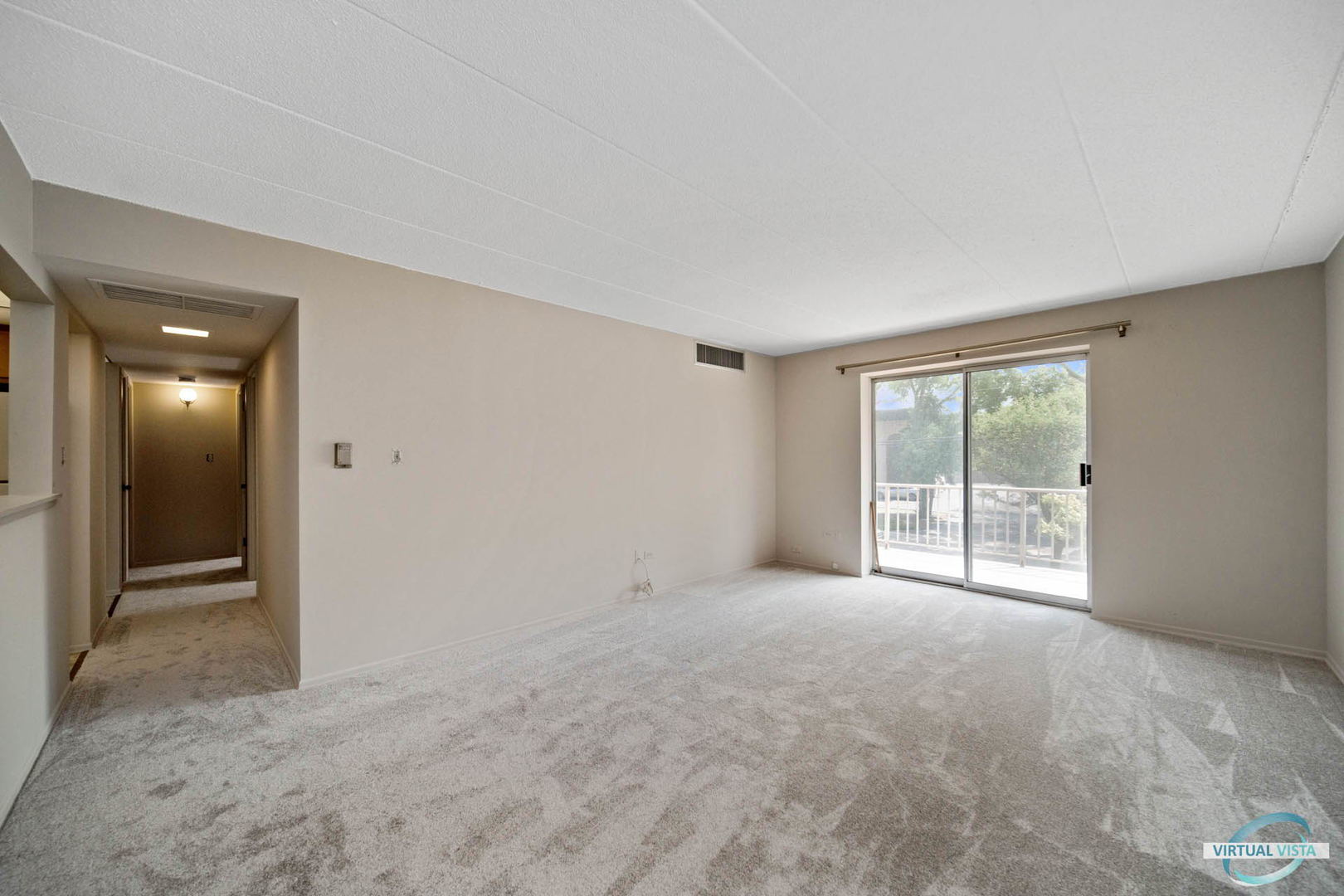 100 West Butterfield Road, Unit 210 Elmhurst, IL 60126 - Photo 5 of 27 a view of an empty room with glass door