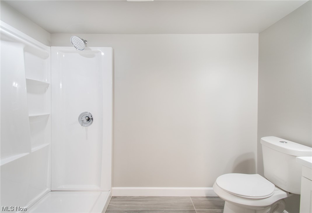 1097 South Meridian Road Youngstown, OH 44511 - Photo 16 of 29 Bathroom with a shower and toilet