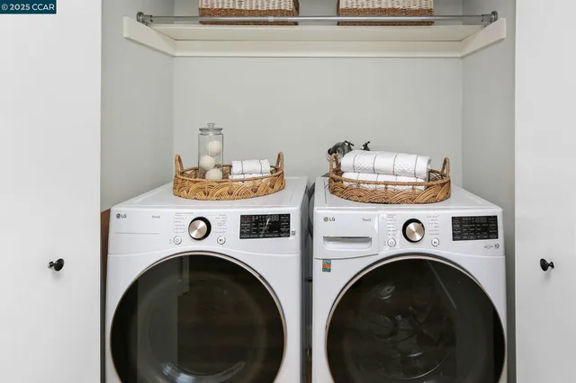 a utility room with dryer and washer