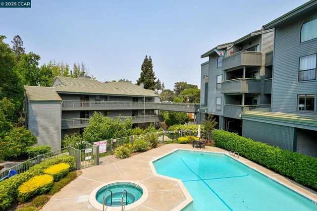 a view of pool with outdoor seating