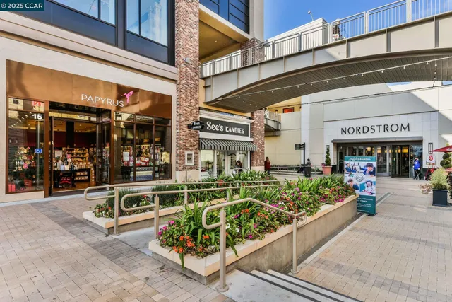 a view of a swimming pool with outdoor seating
