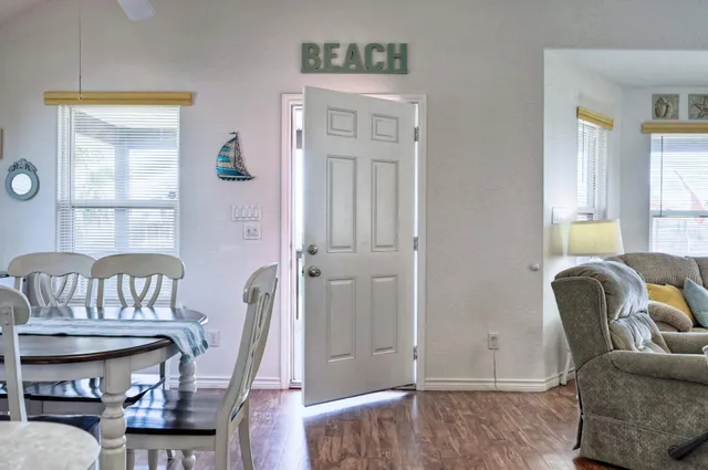 a view of a balcony with chairs