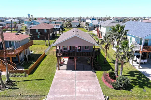 an aerial view of a house with a garden