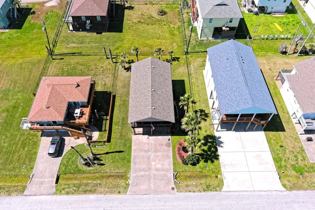 an aerial view of a house with garden