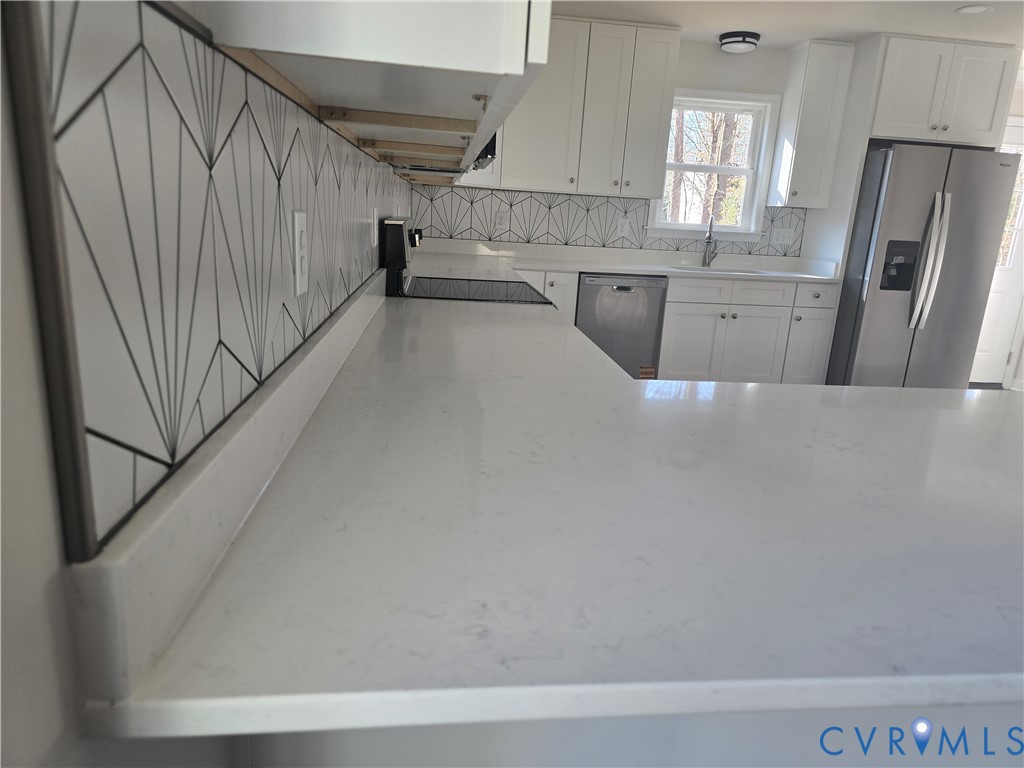 12084 Red Pine Road Ruther Glen, VA 22546 - Photo 15 of 49 Kitchen with appliances with stainless steel finis