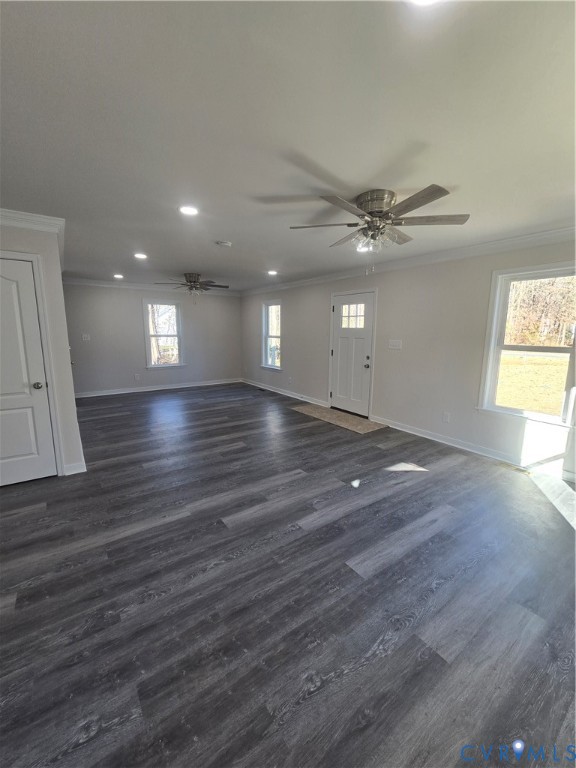 12084 Red Pine Road Ruther Glen, VA 22546 - Photo 17 of 49 Unfurnished living room with crown molding, ceilin