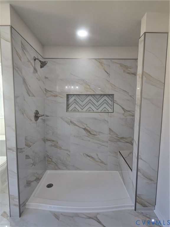 12084 Red Pine Road Ruther Glen, VA 22546 - Photo 26 of 49 Bathroom with marble look tile flooring and a show