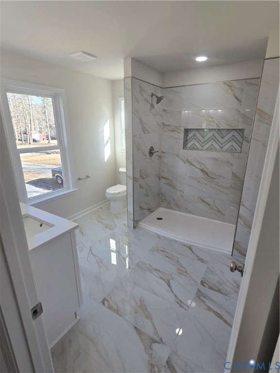 12084 Red Pine Road Ruther Glen, VA 22546 - Photo 27 of 49 Full bath featuring vanity, a marble finish shower