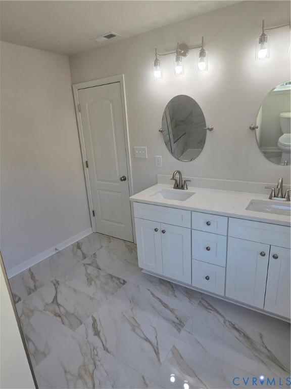 12084 Red Pine Road Ruther Glen, VA 22546 - Photo 32 of 49 Bathroom with light marble finish flooring and dou