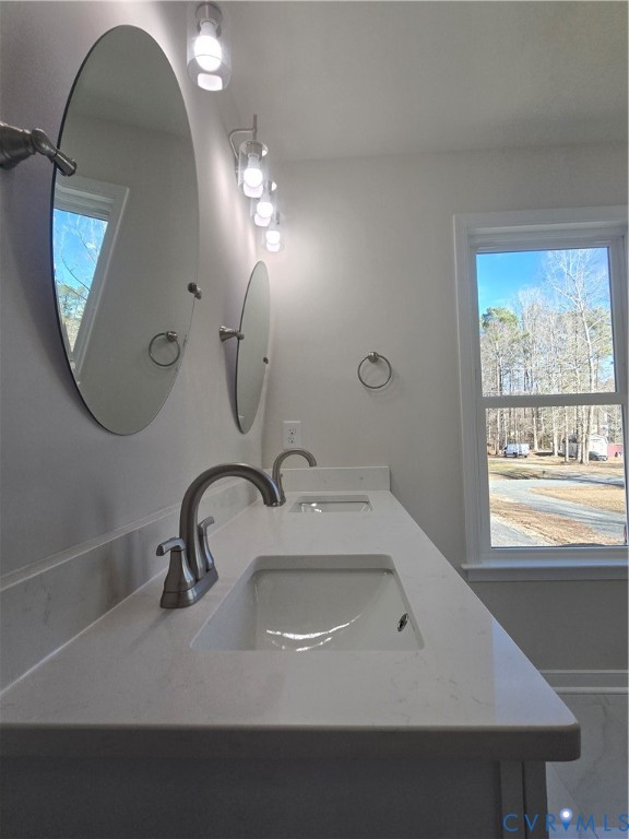 12084 Red Pine Road Ruther Glen, VA 22546 - Photo 35 of 49 Full bathroom featuring double vanity