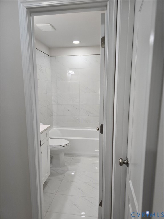 12084 Red Pine Road Ruther Glen, VA 22546 - Photo 37 of 49 Bathroom featuring vanity, light marble finish flo