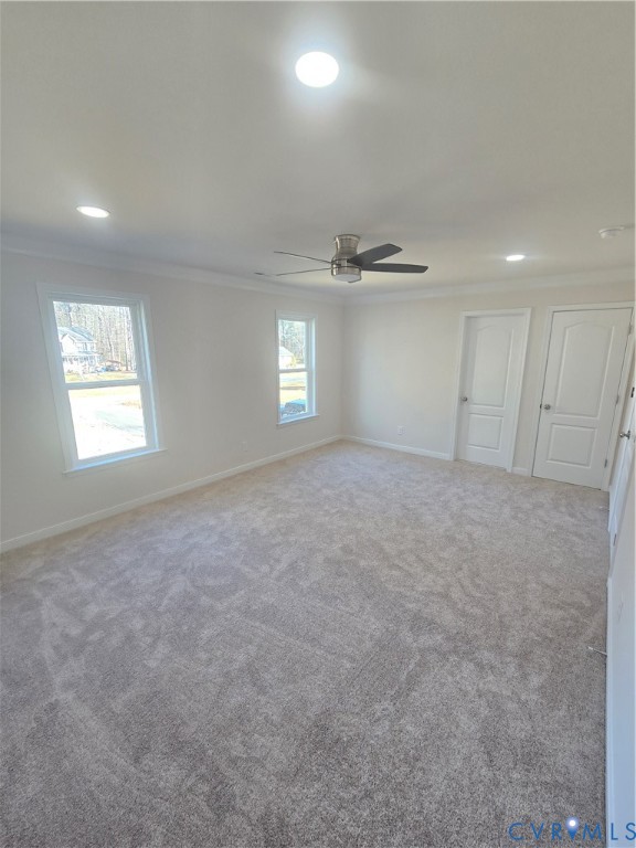 12084 Red Pine Road Ruther Glen, VA 22546 - Photo 40 of 49 Unfurnished room featuring crown molding, carpet,