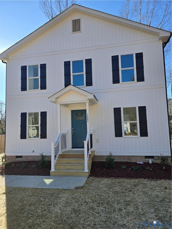 12084 Red Pine Road Ruther Glen, VA 22546 - Photo 5 of 49 View of front facade with crawl space and board an