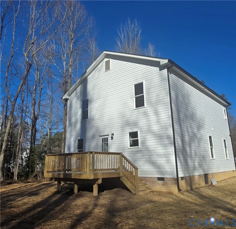 12084 Red Pine Road Ruther Glen, VA 22546 - Photo 6 of 49 Back of house featuring crawl space and a deck