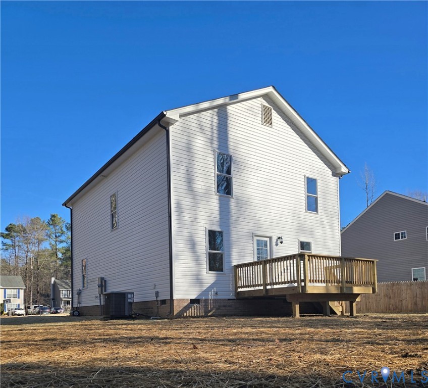 12084 Red Pine Road Ruther Glen, VA 22546 - Photo 7 of 49 Rear view of property featuring a wooden deck and