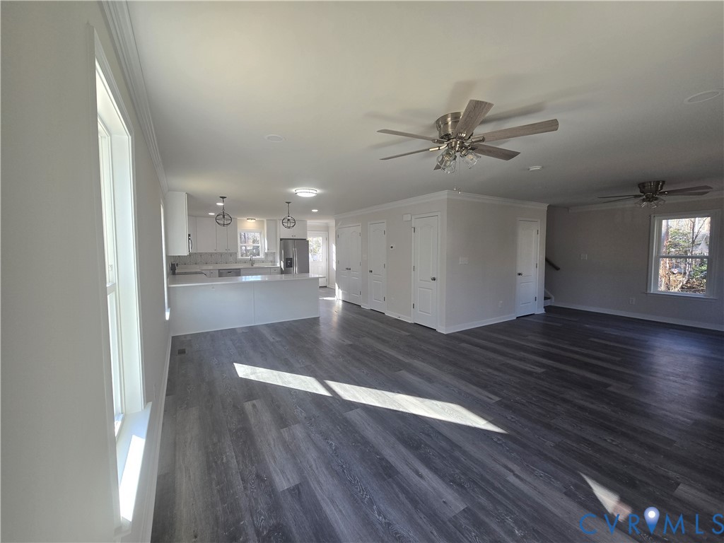 12084 Red Pine Road Ruther Glen, VA 22546 - Photo 8 of 49 Unfurnished living room featuring ornamental moldi