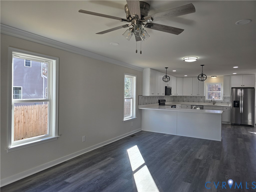 12084 Red Pine Road Ruther Glen, VA 22546 - Photo 9 of 49 Kitchen with white cabinetry, stainless steel appl