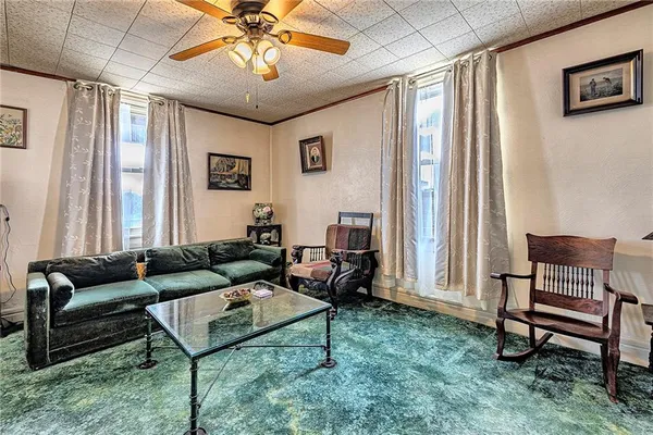 a living room with furniture and a window