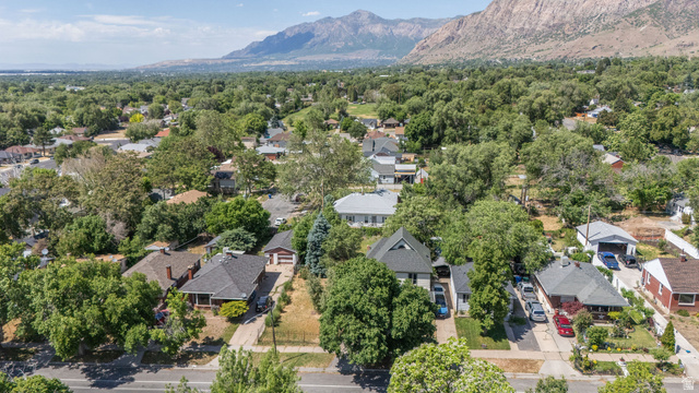1256 24th Street Ogden, UT 84401 - Photo 34 of 34 Residential properties surrounded by mature trees with mountain terrain in the background