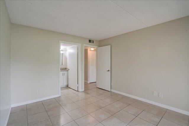 1104 Meadows Circle Boynton Beach, FL 33436 - Photo 16 of 27 a view of an empty room
