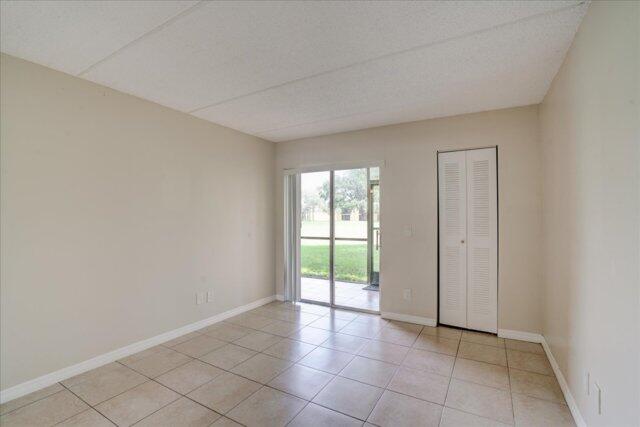 1104 Meadows Circle Boynton Beach, FL 33436 - Photo 17 of 27 a view of an empty room and window
