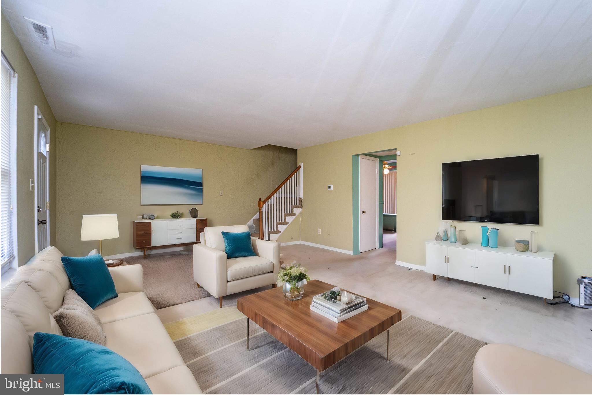 1923 Addison Road South District Heights, MD 20747 - Photo 2 of 30 a living room with furniture and a flat screen tv
