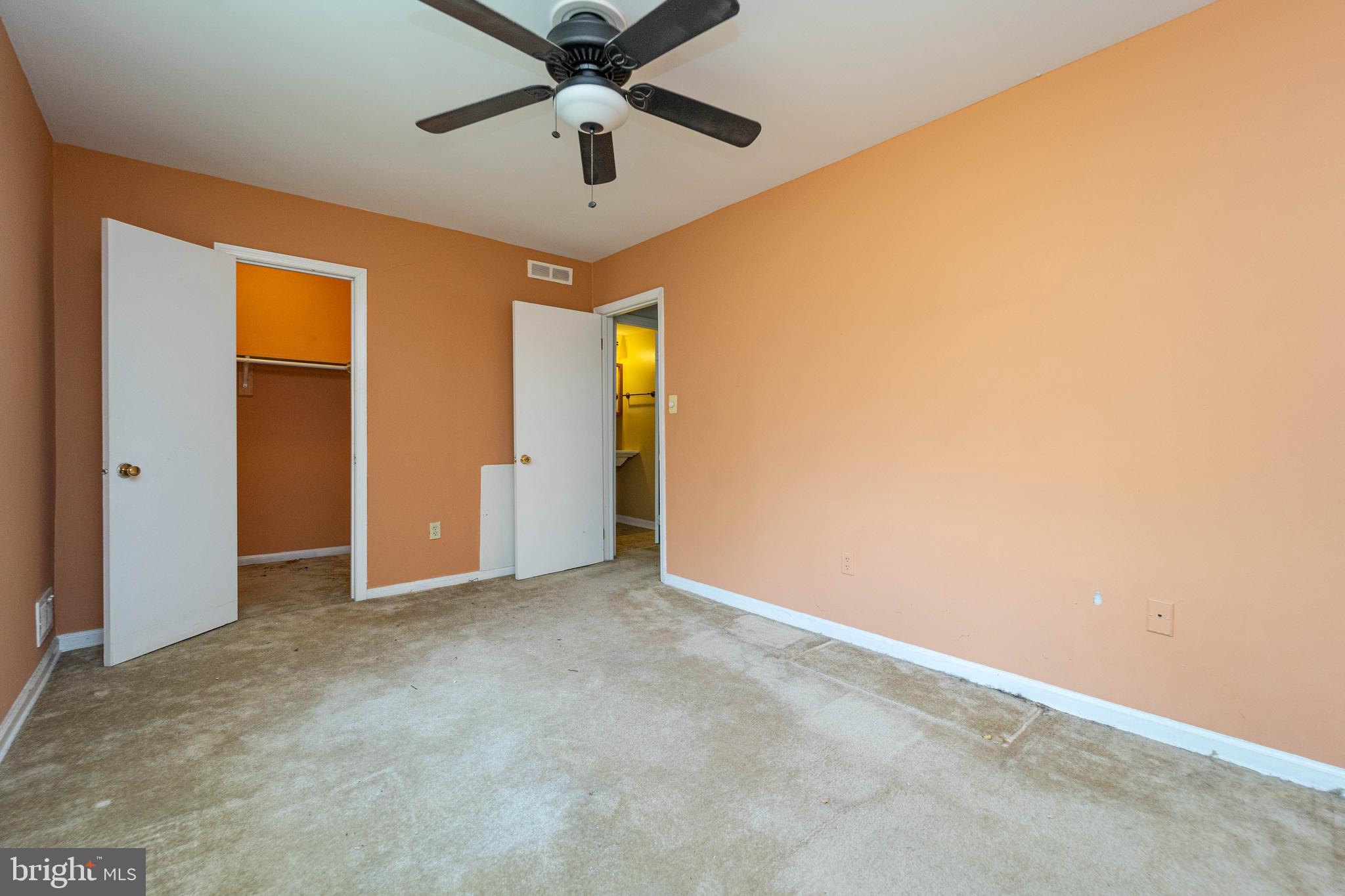 1923 Addison Road South District Heights, MD 20747 - Photo 27 of 30 an empty room with ceiling fan and window