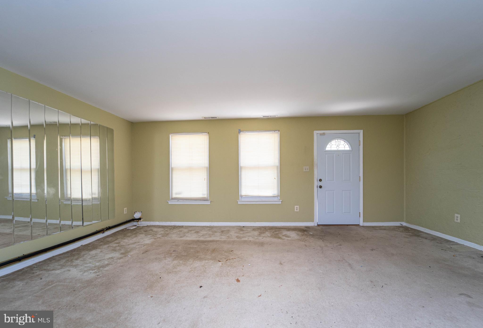 1923 Addison Road South District Heights, MD 20747 - Photo 6 of 30 an empty room with windows